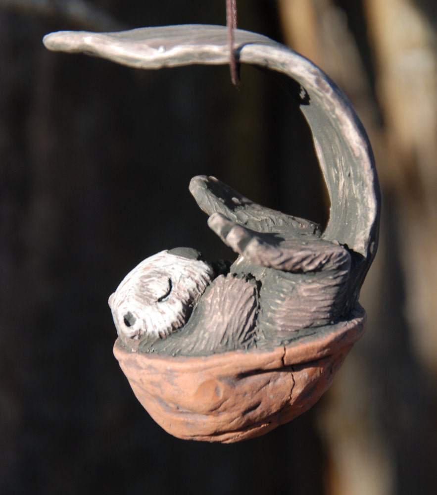 Sleeping Sea Otter walnut ornament
