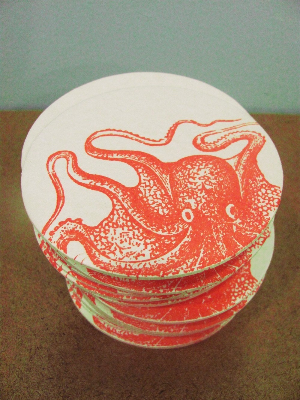 4 crazy orange Gocco screenprinted octopus coasters