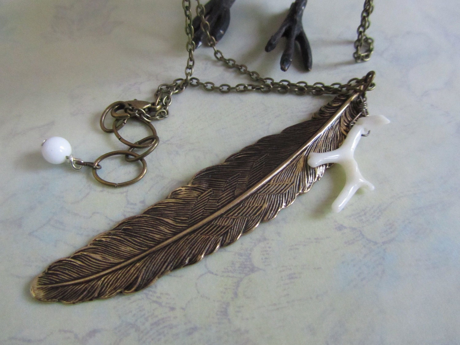 Feather and Bone brass and coral necklace
