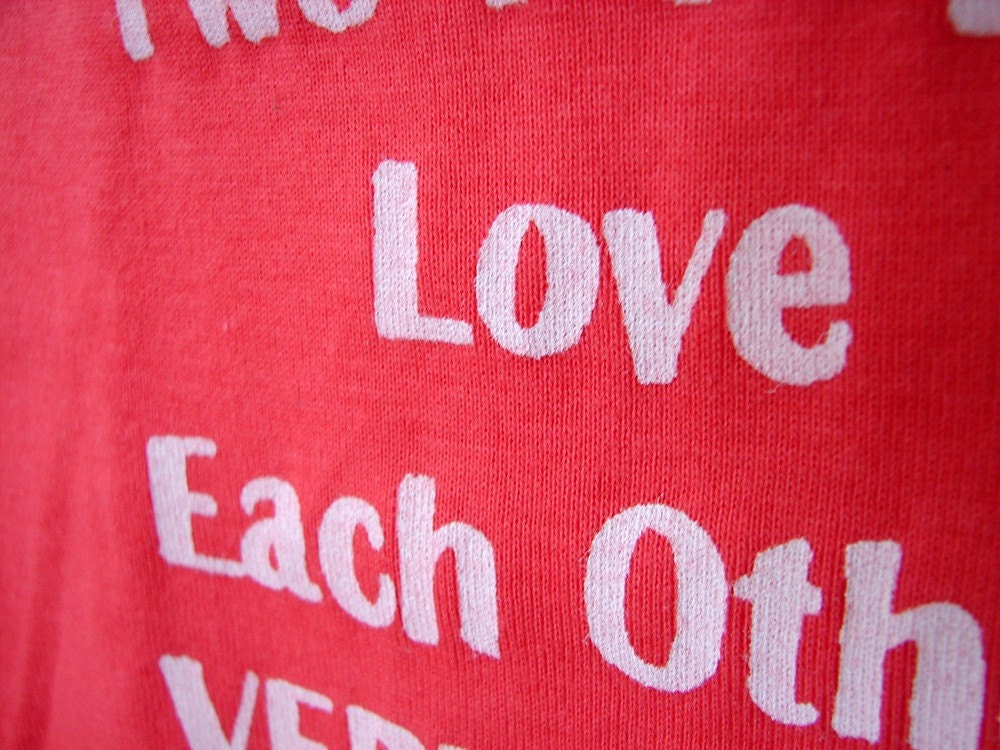 When Two People Love Each Other Very Much Onesie size 6-12mos (coral/white)