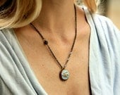 Fly Away Necklace- Light Blue and gold swallow bird pendant  in lace edge setting on delicate antique brass chain