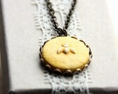 Little Bee Necklace - cold clay pendant on antique brass setting