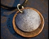 Sarra - sterling silver and copper hand-hammered pendant necklace