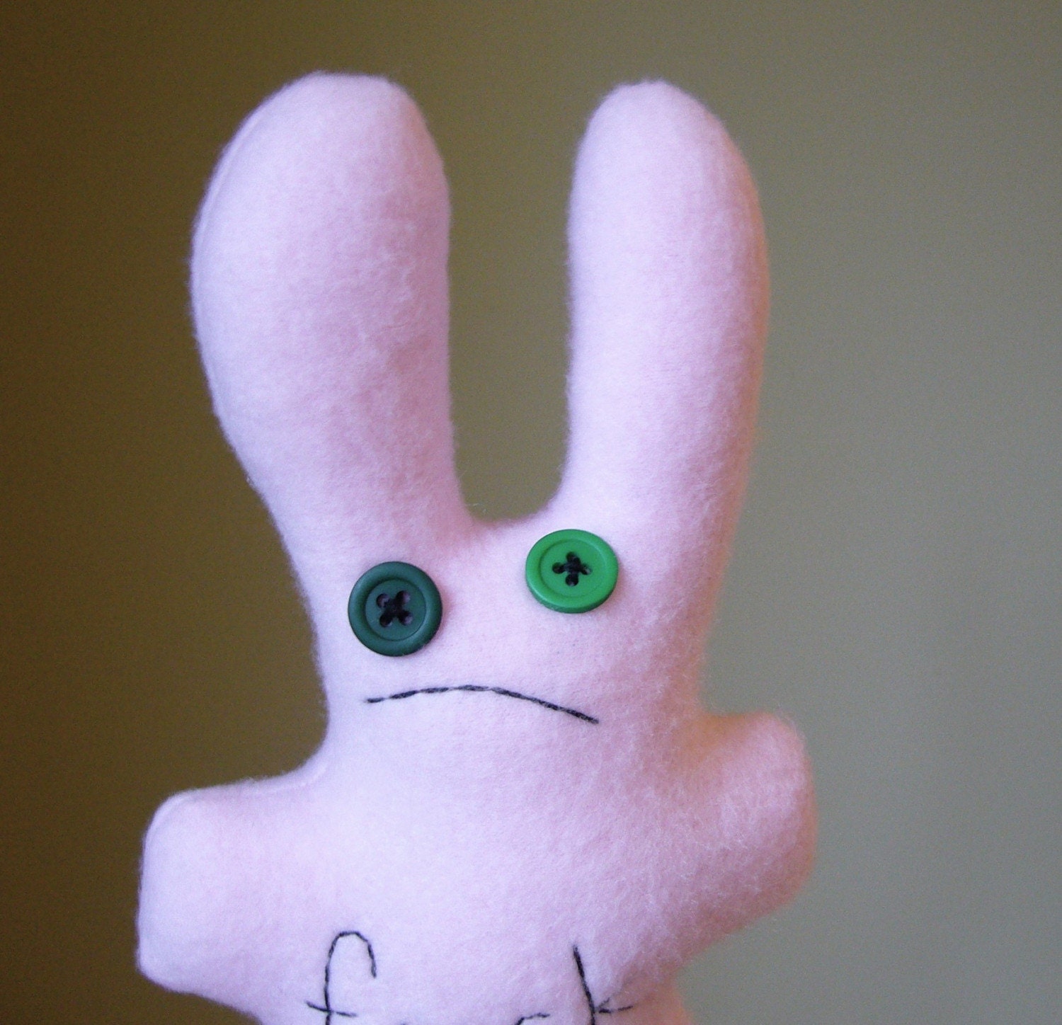 woebegone f.ck bunny, pink fleece