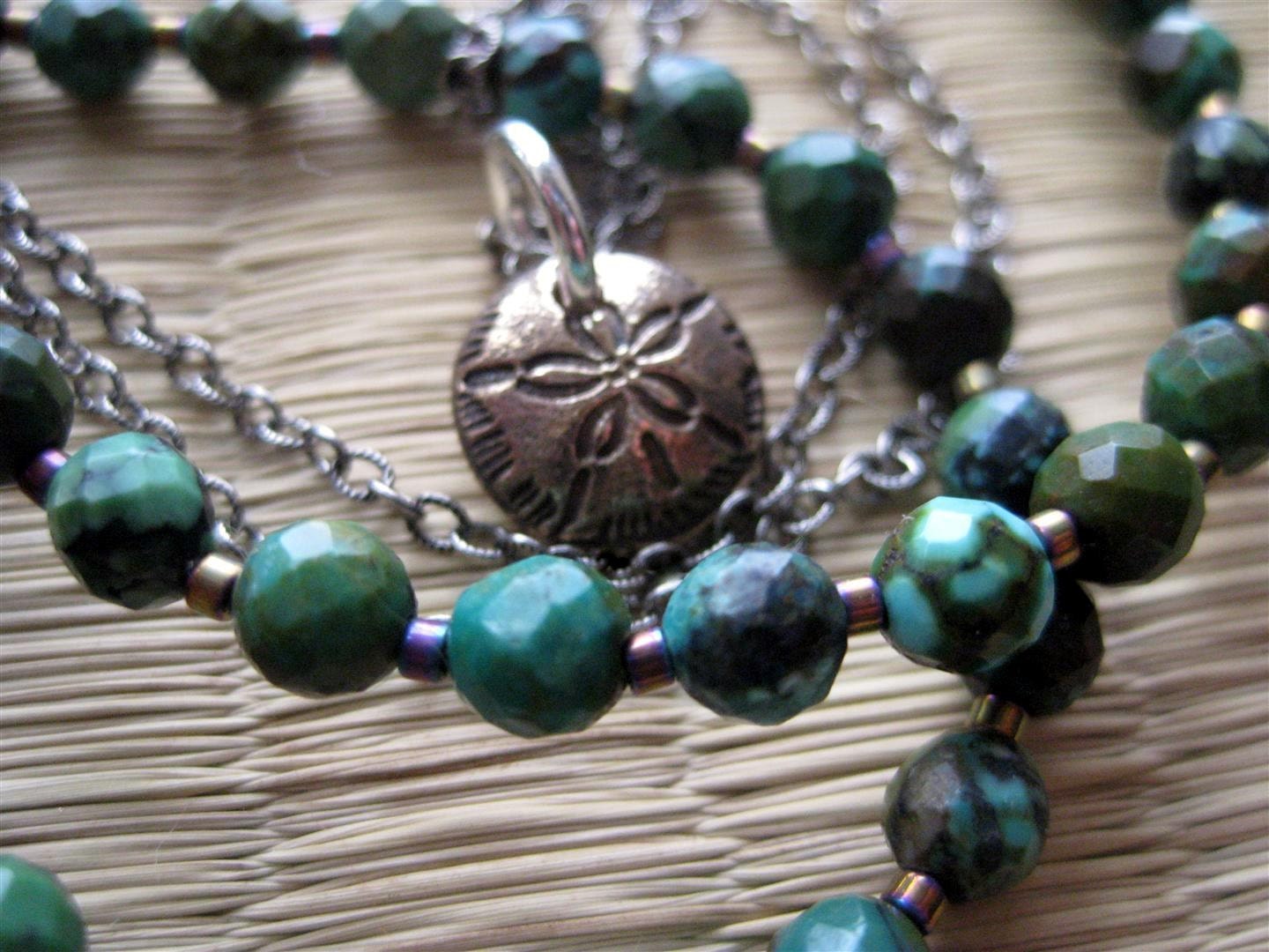 Bronze Sand Dollar Pendant Layered Over Faceted Turquoise Beads