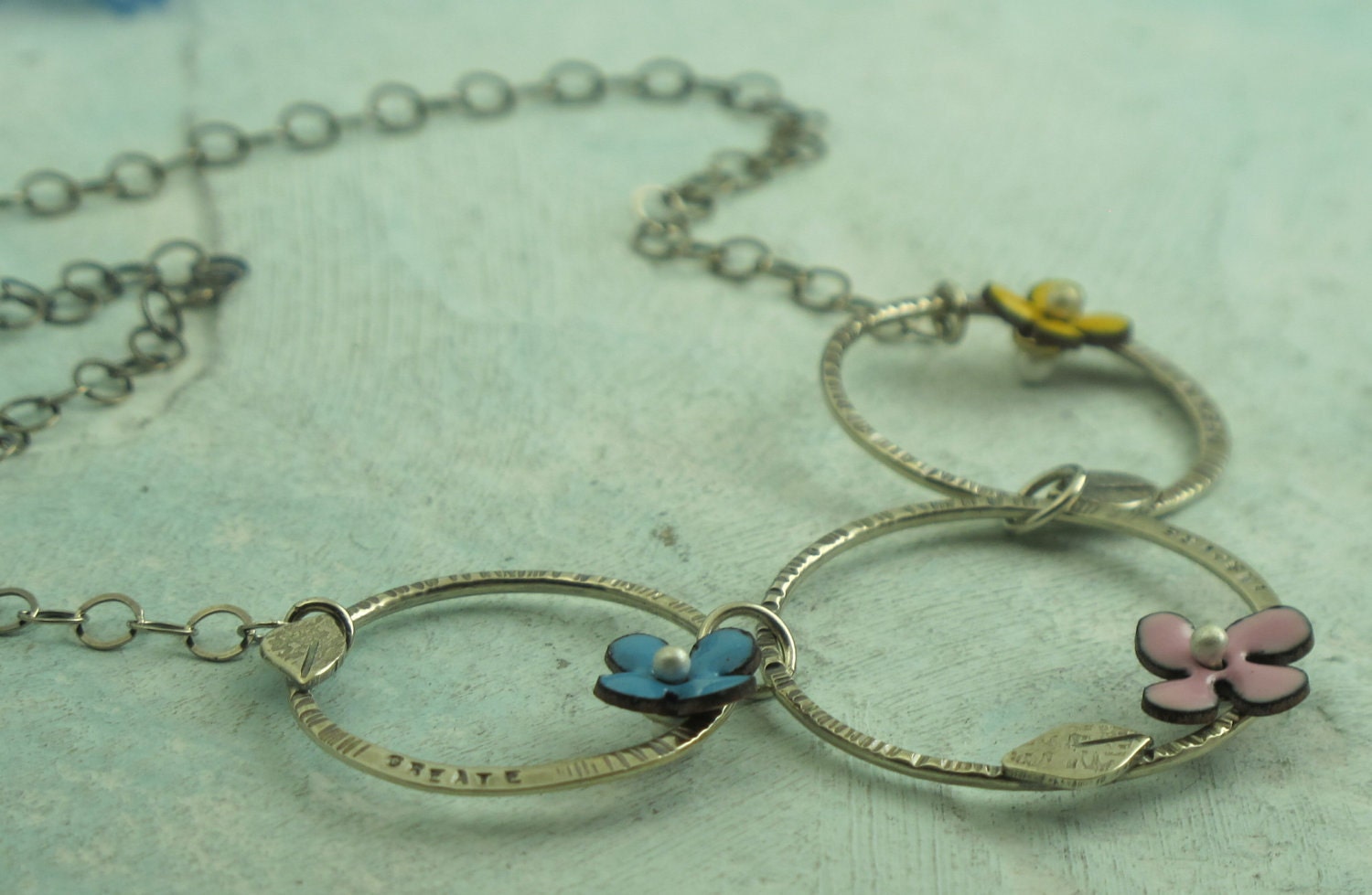 Create Inspire Dream - sterling silver and enamel flower necklace by Kathryn Riechert