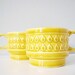 Two vintage cups stacking ceramic raindrop pattern - caramel yellow mugs with rain drops