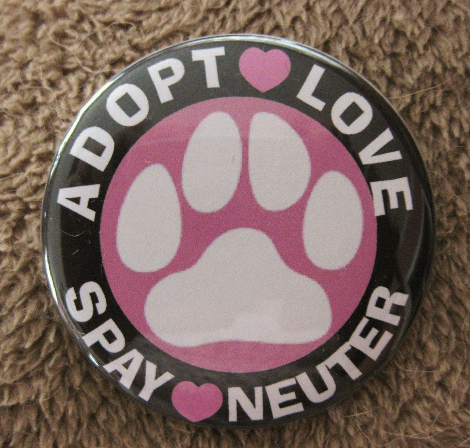 adopt love spay neuter pink paw badge
