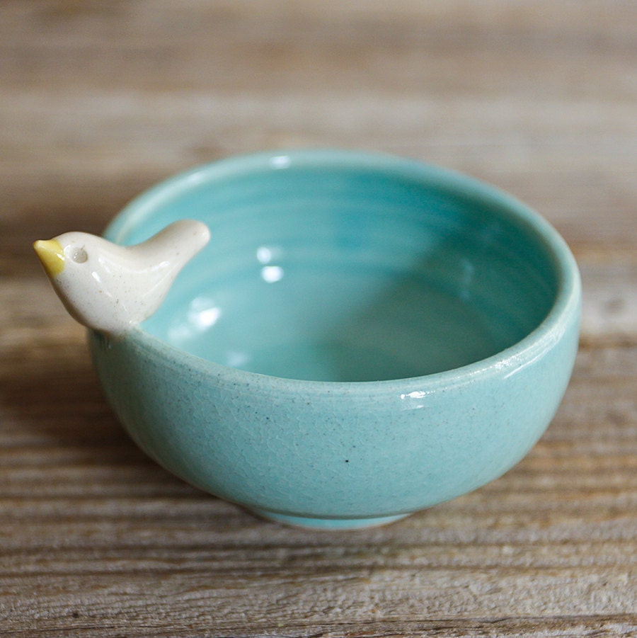 Sweet Little White Bird on an Aqua Bowl