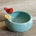 Sweet Little Red Bird on an Aqua Bowl with Nest