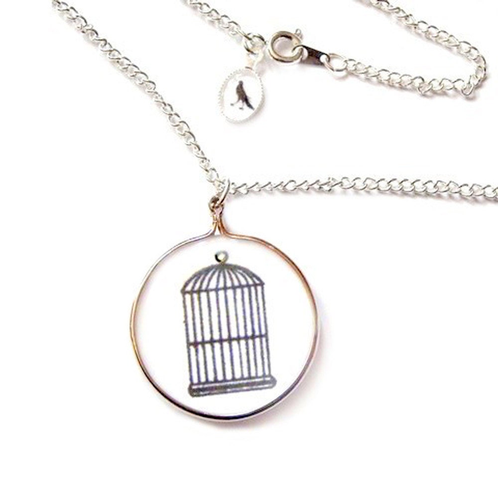 Thaumatrope illusion NECKLACE .. The Bird and the Cage .. black on white Edition