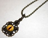Antiqued Brass Filigree Yellow Evil Dragon Glass Taxidermy Eye Pendant with Ball Chain Necklace