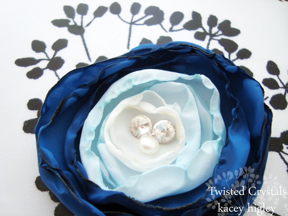 Blue handmade flower with off white, fresh water pearls, Swarovski crystals.