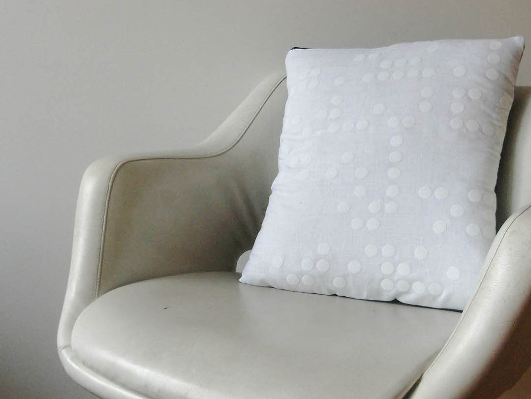 FLOCKED Braille Cushion White
