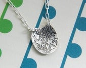 Damask etched pendant