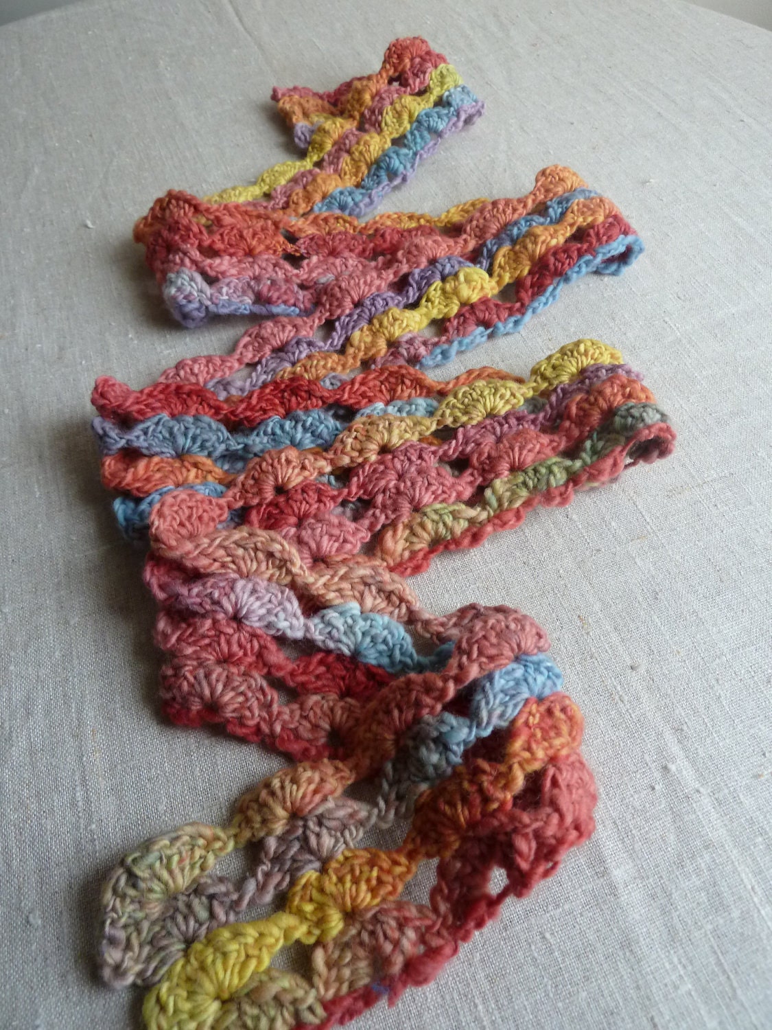 Rainbow scarf made from handspun organic yarn