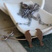 love birds necklace- hand cut silhouettes- copper and sterling silver