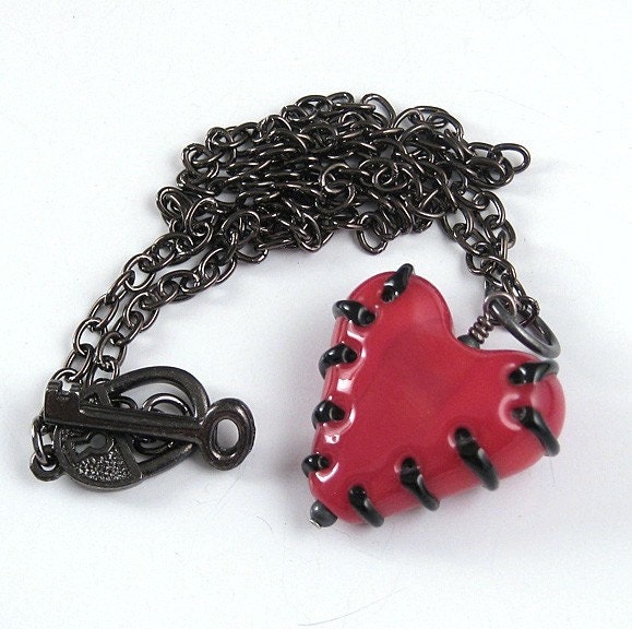 bright red stitched heart