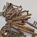 RESERVED for April Iris McLeod - Collection of 100 Antique Keys in Steel and Brass and Iron