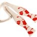 Poppy bow tie. Cream and dark coral freestyle & adjustable tie. Silkscreened floral necktie.