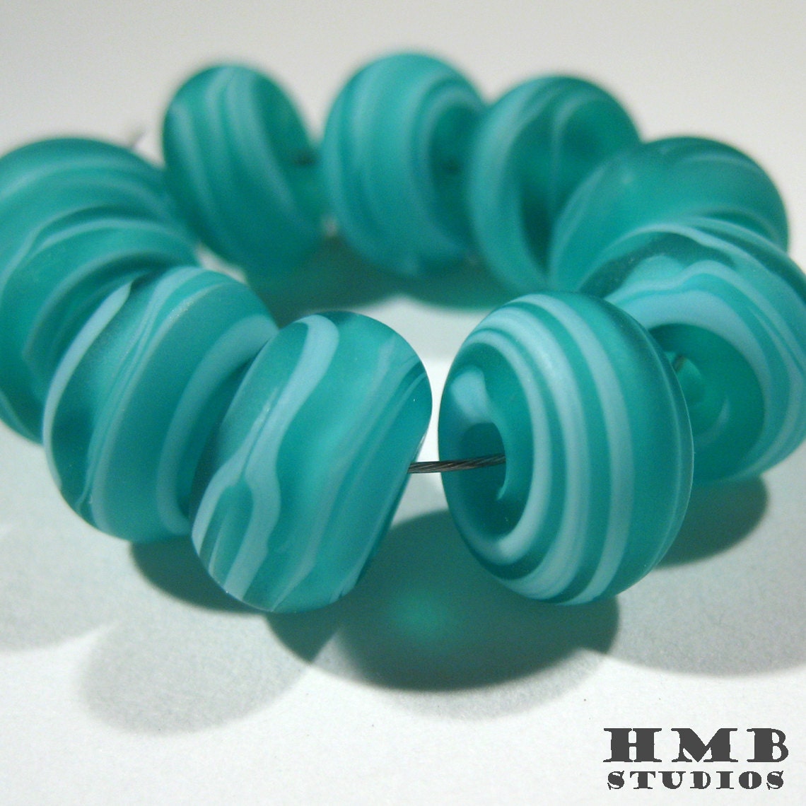 Small Handmade Lampwork Spacers - Light Blue on Teal