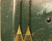 art deco arrow earrings in brass vintage on a long chain