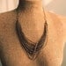 SALE layered bib necklace with multi chains in gold bronze steel