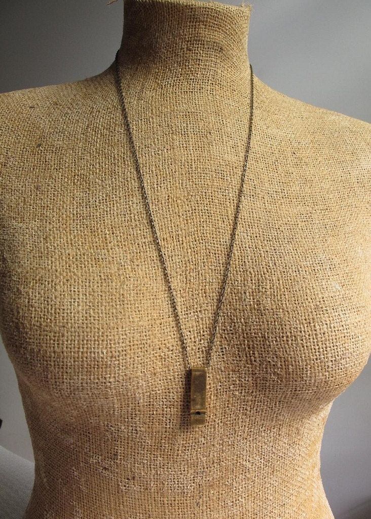 whistle statement necklace in brass on long minimal chain