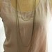 long minimal necklace with multi layered chains