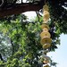 Mudpuppy Moon wind chimes organic hanging disc bells sculpture - natural buff stoneware