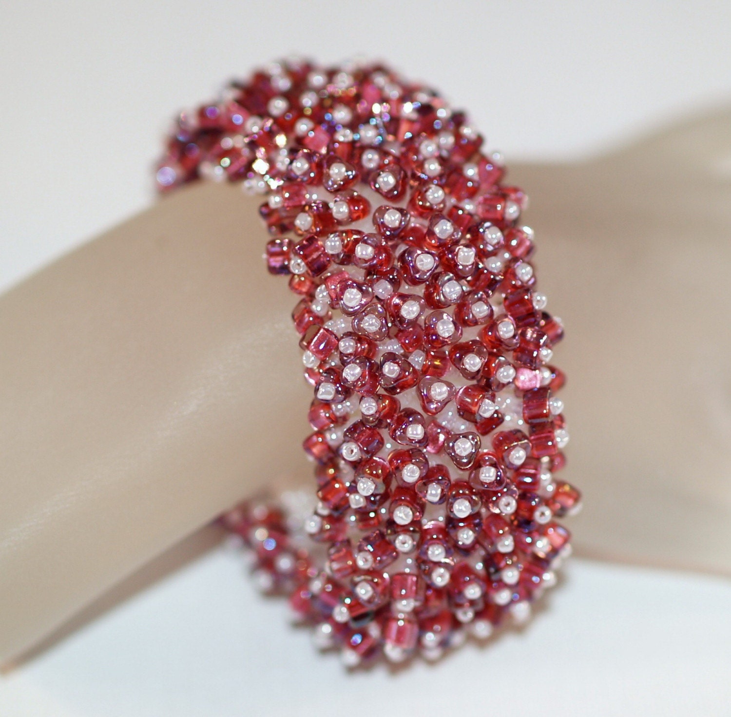 Cranberry Juice Cocktail ... Bracelet . Fringed . Beaded . Lush . Caterpillar . Pearly White . Red . Supple . Texture . Holiday Accessory
