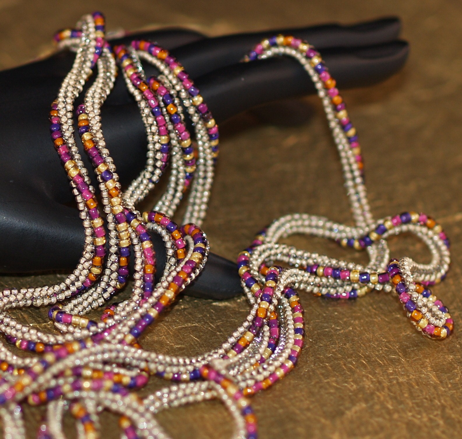 Marrakesh ... Necklace . Beadwoven . Bracelet . Twisted . Rich Colors . Sand . Magenta . Purple . Orange . Gold . Versatile . Luscious