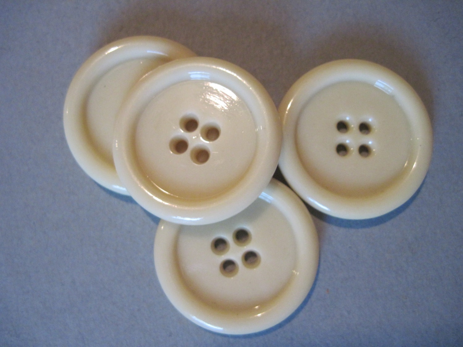 set of 4 large creamy natural colored buttons