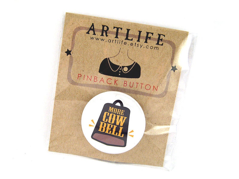 More cowbell pinback button badge - PACKAGED - Fun unique cheap gift