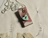 New Alice in wonderland heart necklace
