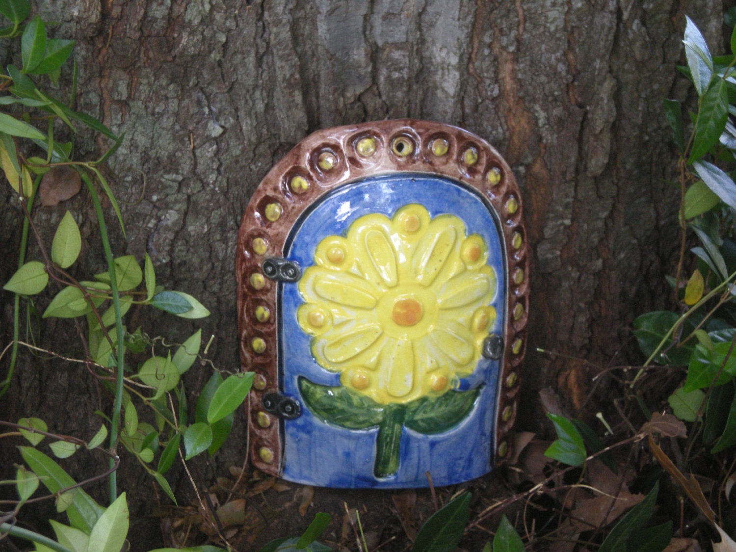 Made to order custom fairy doors by muddy muse pottery