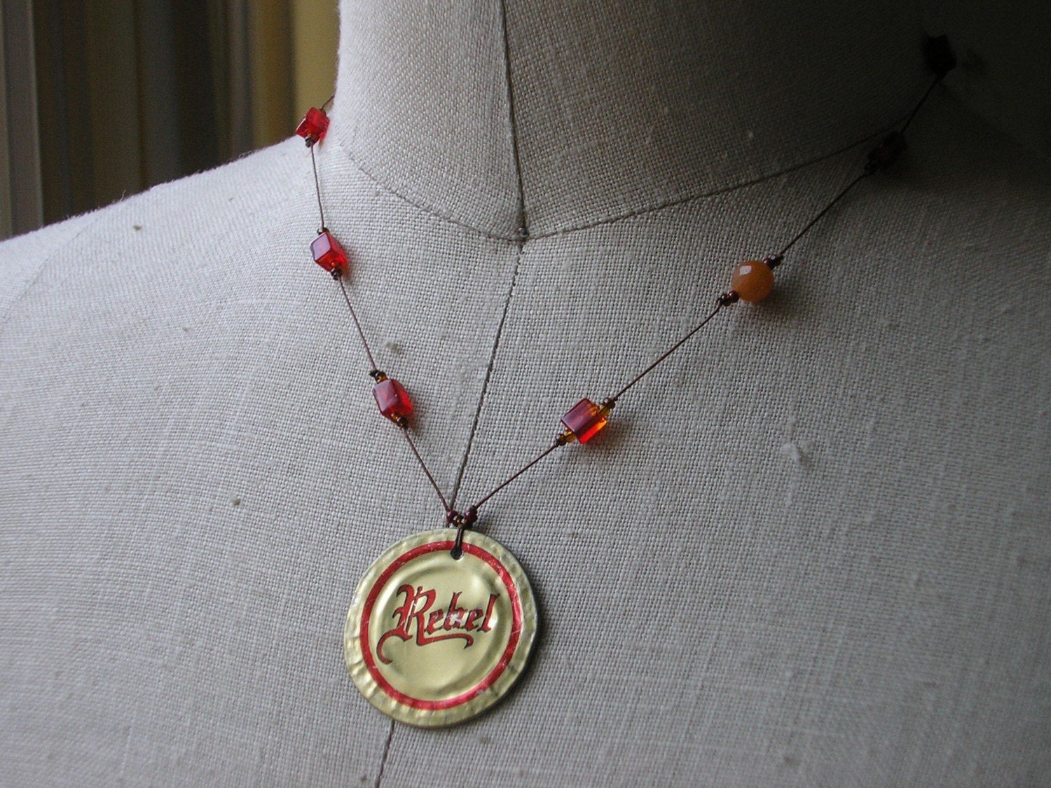 Rebel in red glass and aventurine.