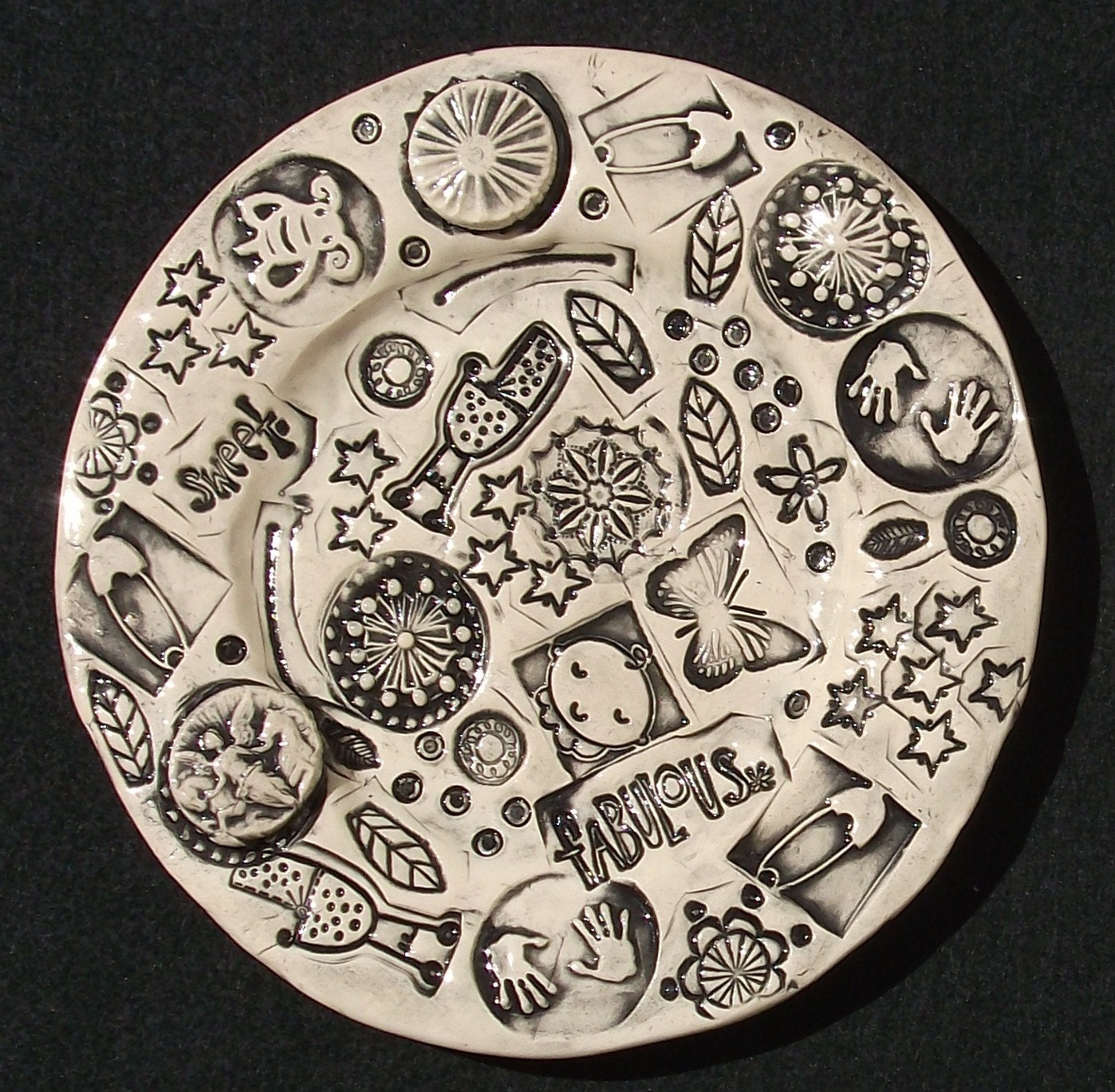 Moonlight visions of baby black and white pottery plate
