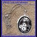 DIVINE BLISS DESIGNS - Silver Tone Pendant With Chain - Black and White Flowers