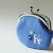 Personalized coin purse in blue with white initial and flowers