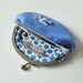 Personalized coin purse in blue with white initial and flowers