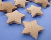 12 wood stars . sculptured dimensional . 1 3/8" size
