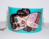 teal pirate girl tattoo cuff bracelet