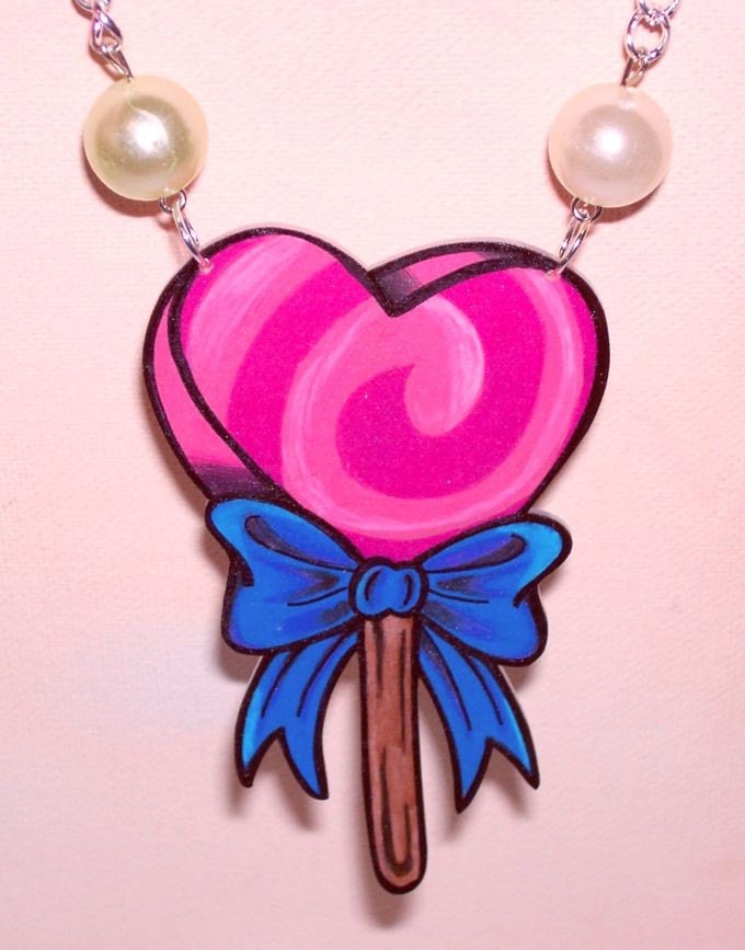 heart lollipop and pearl necklace