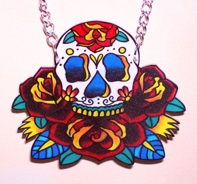 sugar skull in a bed of roses necklace