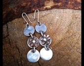 Three circle earrings.