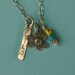 ONE WORD charm necklace.