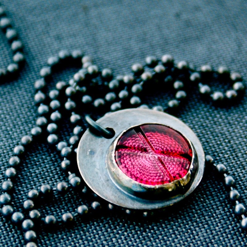 X. Pendant on a Chain.