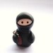 Little Black Ninja with Nunchucks