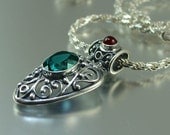 GERTRUDE silver pendant with London Blue Topaz and Garnet